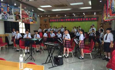 千赢国际示范乐团青岛台东六路小学管乐团大师班活动成功举办
